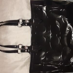 Medium Coach bag.  Some flaws outside.